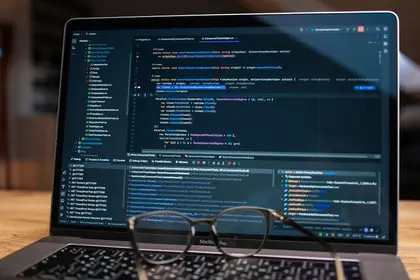 Code open in an editor on a laptop