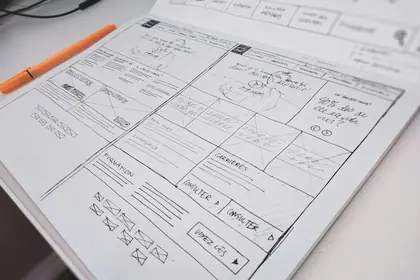 Hand-drawn wireframes of a web app